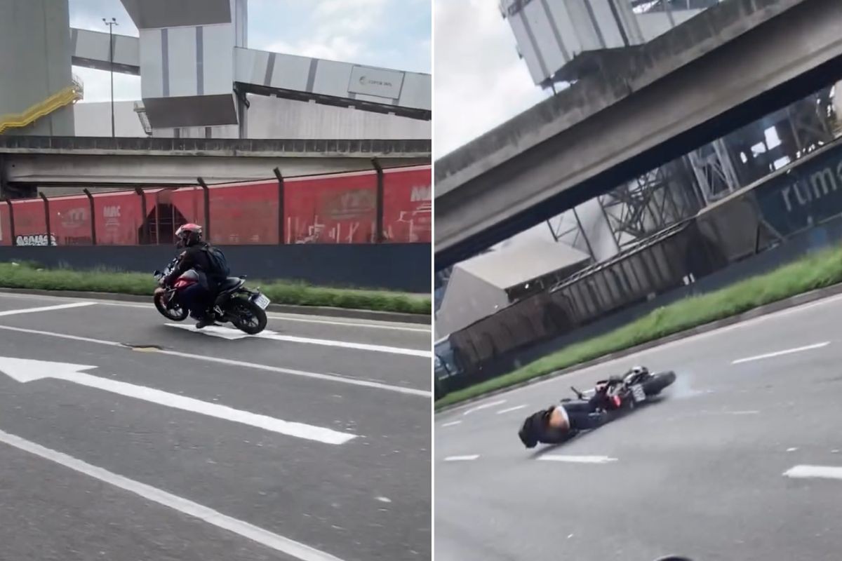 Motociclista cai após passar por buraco na Avenida Perimetral em Santos, SP; VÍDEO